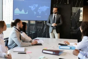 nearshoring demonstration with office coworkers having a chat inside a nearshore office